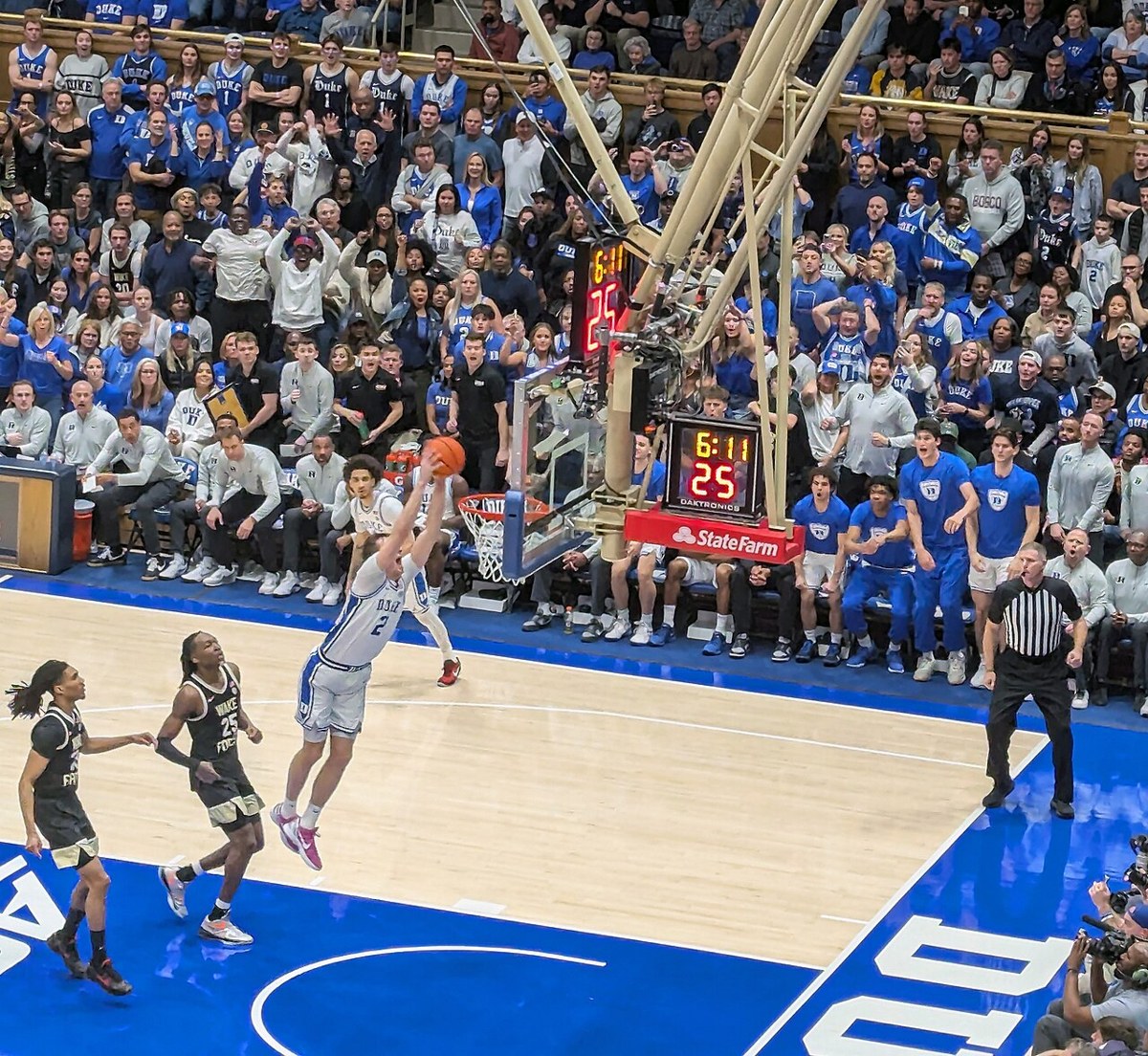 Cooper Flagg dunking for Duke in March 2025. Archival college photograph, not Wednesday’s NBA opener.